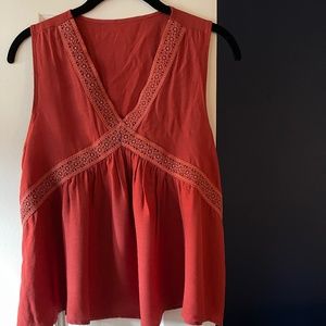 Sleeveless empire waist  embroidered top